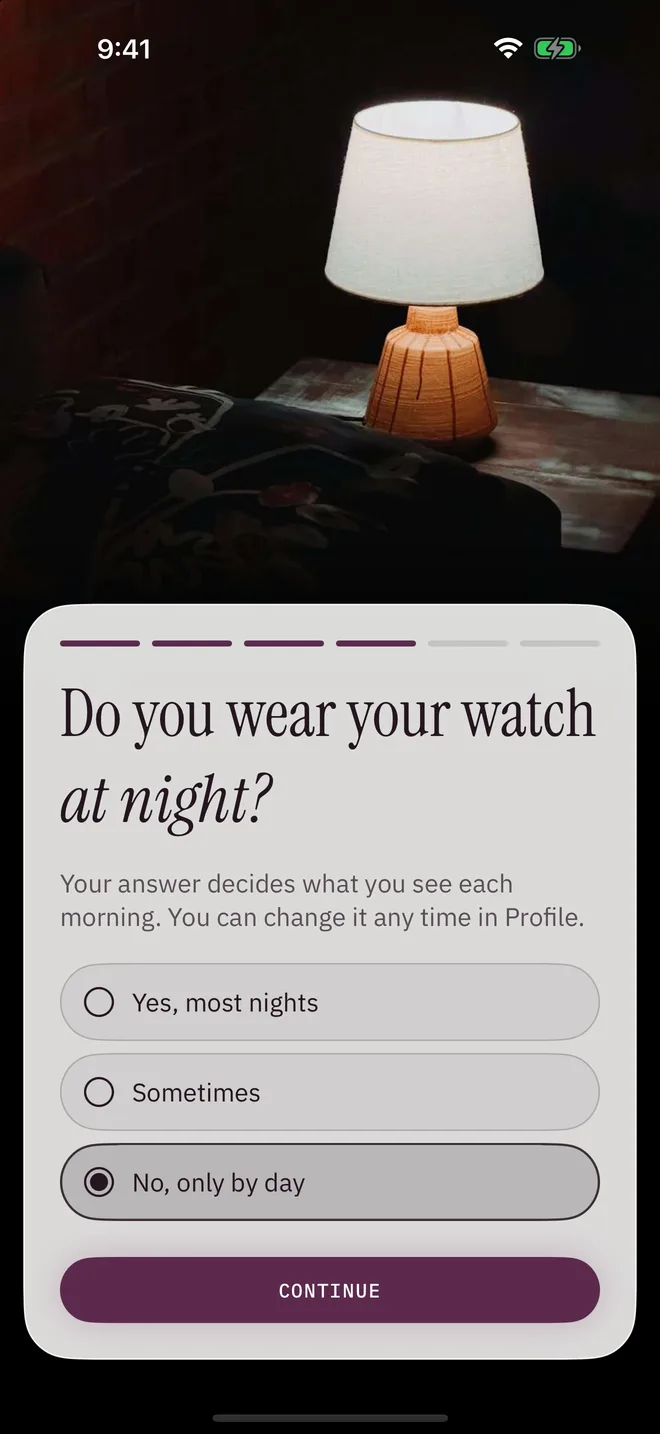 Astrea's onboarding step asking “Do you wear your watch at night?”, with three answers: Yes, most nights; Sometimes; No, only by day. The last one is chosen, over a photo of a lamp on a nightstand.